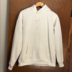 Prisana Bay Elegant Gray Hoodie with Pink Subtle Bow Detail